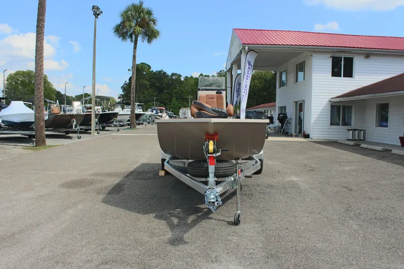 Slide: The Image of 2025 Avid 18 Rogue CC boat on trailer at dealership. - 4