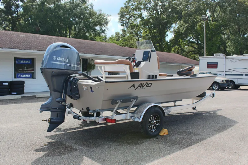 Slide: The Image of 2025 Avid 18 Rogue CC boat with Yamaha outboard motor on trailer. - 8