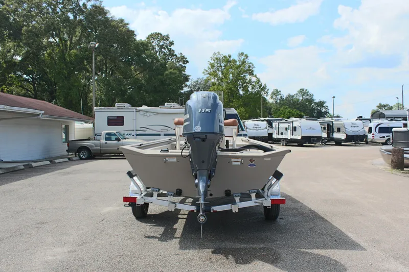 Slide: The Image of Avid 18 Rogue CC 2025 boat on trailer in parking lot with RVs. - 9
