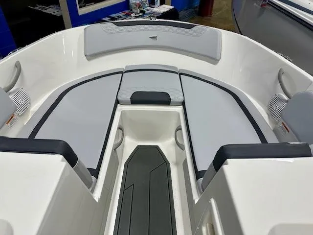 Slide: The Image of 2025 Bayliner Element M17 boat interior with gray seating and modern design. - 4