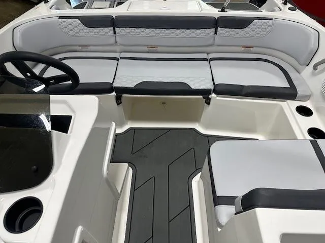 Slide: The Image of 2025 Bayliner Element M17 boat interior with sleek seating and modern design. - 5
