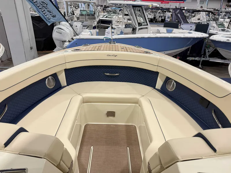 Slide: The Image of 2025 Chris-Craft Calypso 32 boat interior with luxurious seating and elegant design. - 8