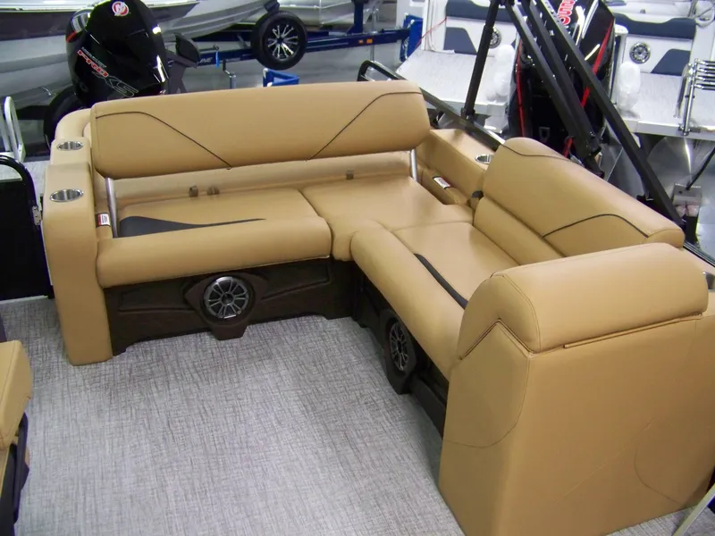 Slide: The Image of 2025 Avalon Venture 85 Versatile rear bench with tan upholstery and integrated speakers. - 4
