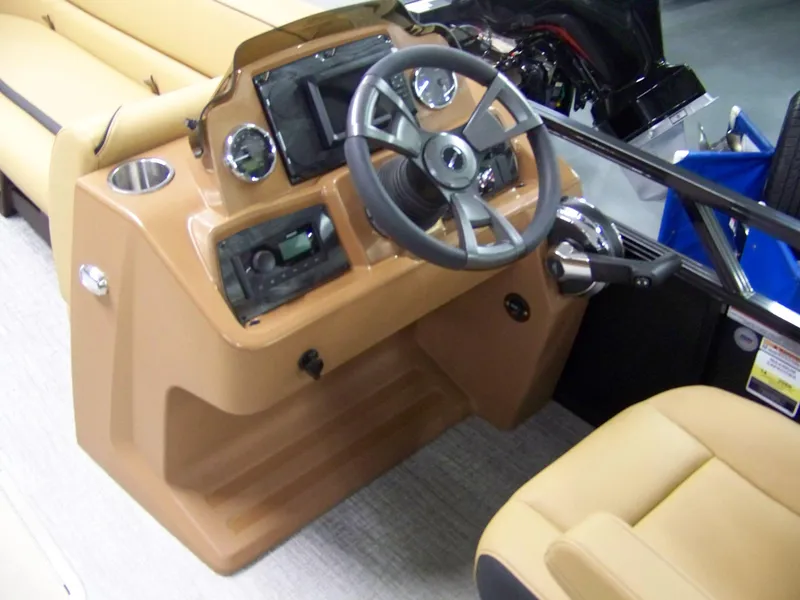 Slide: The Image of 2025 Avalon Venture 85 Versatile rear bench, tan interior, steering console, modern design. - 6