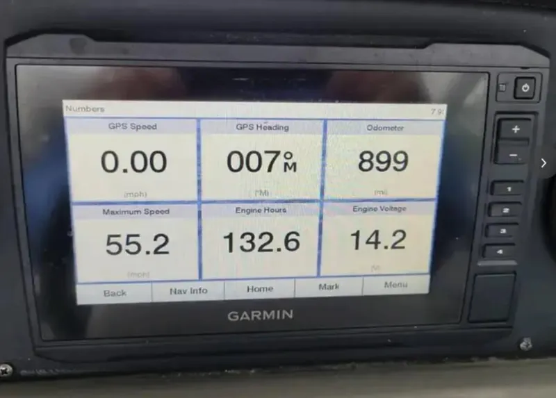 Slide: The Image of Garmin display showing boat metrics: speed, heading, odometer, max speed, engine hours, voltage. - 6
