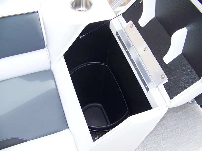 Slide: The Image of Interior storage compartment of 2025 Avalon Venture 21QL boat with cup holder. - 12
