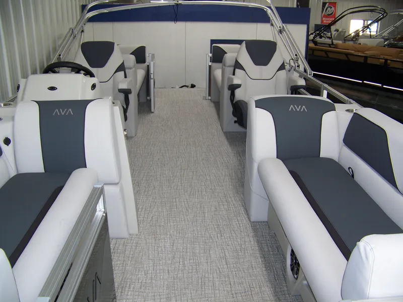 Slide: The Image of Interior of 2025 Avalon Venture 21QL pontoon boat with gray seating and modern design. - 4