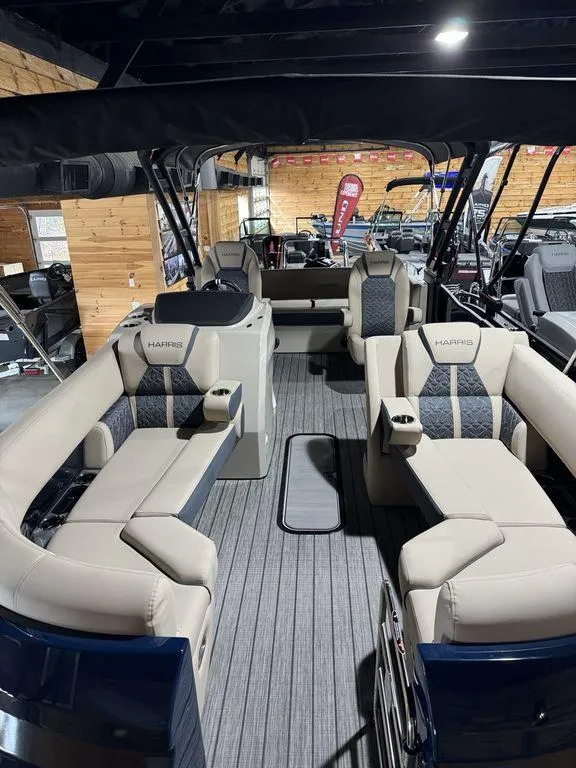 Slide: The Image of 2025 Harris Grand Mariner 230 SLDH pontoon boat interior with luxurious seating and modern design. - 4