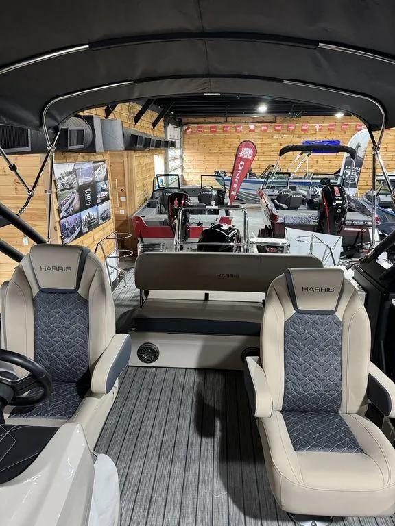 Slide: The Image of 2025 Harris Grand Mariner 230 SLDH interior with luxury seating and modern design. - 5