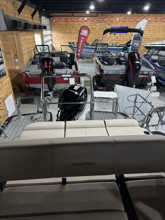 Slide: The Image of 2025 Harris Grand Mariner 230 SLDH pontoon boat in showroom with other boats. - 8