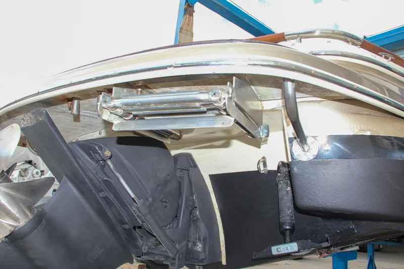 Slide: The Image of 2014 Chris-Craft Capri 21 boat propeller and stern detail on display. - 14