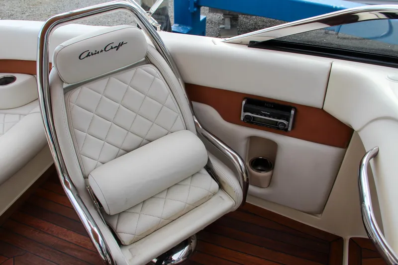 Slide: The Image of Dashboard of 2014 Chris-Craft Capri 21 boat with classic gauges and controls. - 31