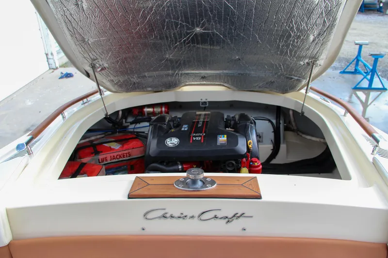 Slide: The Image of 2014 Chris-Craft Capri 21 boat with elegant wood and leather detailing. - 6