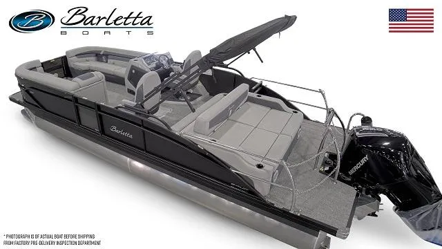 Slide: The Image of 2025 Barletta C24UC pontoon boat with sleek design and modern features. - 14