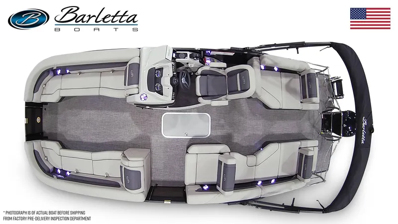 Slide: The Image of 2025 Barletta C24M pontoon boat, top view, spacious seating, modern design, American flag. - 2