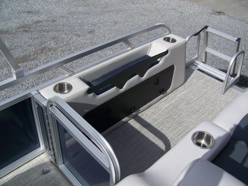 Slide: The Image of 2025 Avalon Venture 85 23VRB boat interior with seating and cup holders. - 11