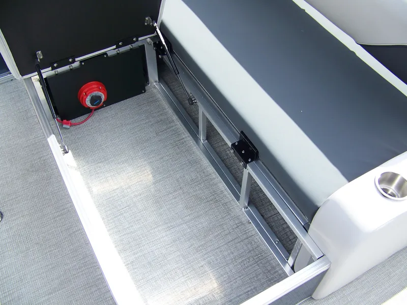 Slide: The Image of Avalon Venture 85 23VRB 2025 boat interior storage compartment with seating and cup holder. - 15