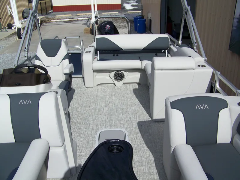 Slide: The Image of 2025 Avalon Venture 85 23VRB boat interior with white and gray seating. - 5