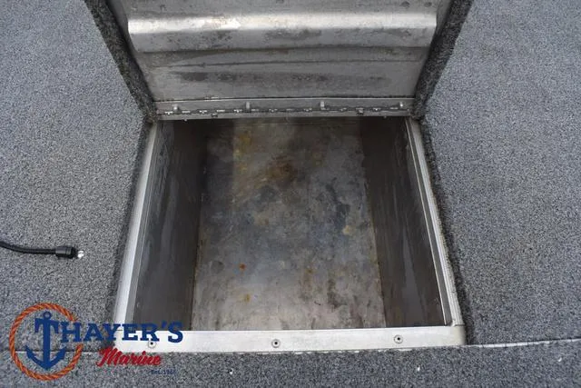 Slide: The Image of Open storage compartment on 2019 Tracker Pro 170 boat deck. - 12