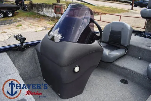 Slide: The Image of 2019 Tracker Pro 170 boat interior with steering console and seating. - 17