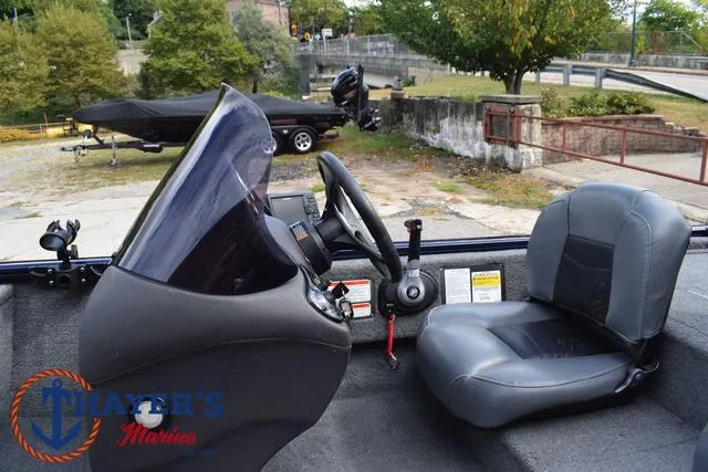 Slide: The Image of 2019 Tracker Pro 170 boat interior with steering console and seat. - 20