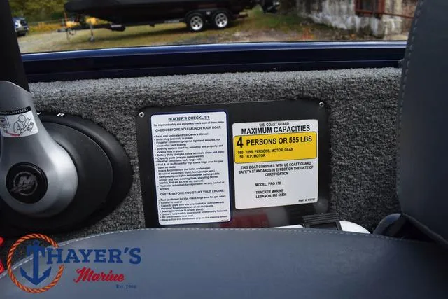 Slide: The Image of 2019 Tracker Pro 170 boat capacity label, showing maximum of 4 persons or 555 lbs. - 23