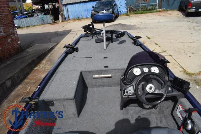 Slide: The Image of 2019 Tracker Pro 170 boat interior with steering console and seating. - 29