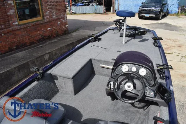 Slide: The Image of 2019 Tracker Pro 170 boat interior with steering wheel and controls at Thayer's Marine. - 30