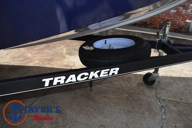 Slide: The Image of 2019 Tracker Pro 170 boat trailer with spare tire, Thayer's Marine logo visible. - 6
