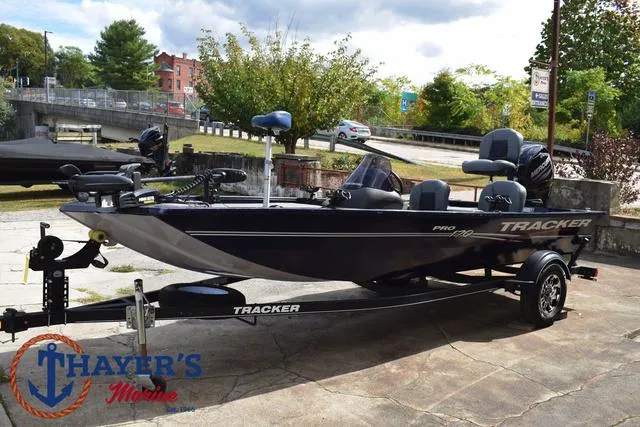 Slide: The Image of 2019 Tracker Pro 170 boat on trailer at Thayer's Marine dealership. - 7