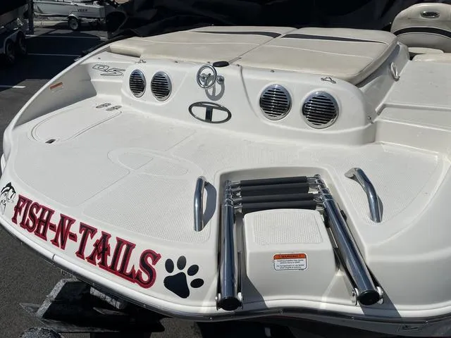 Slide: The Image of 2014 Tahoe Q5i SF boat with "Fish-N-Tails" decal and swim platform. - 6