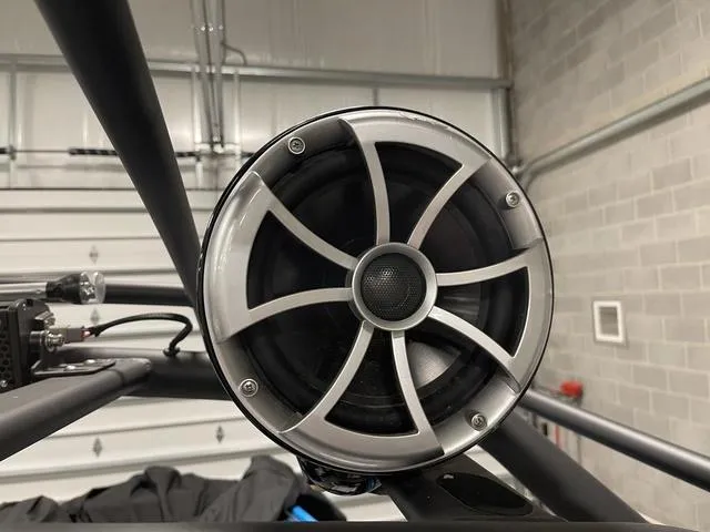 Slide: The Image of Close-up of a speaker on a 2023 Yamaha Boats 255XD. - 38