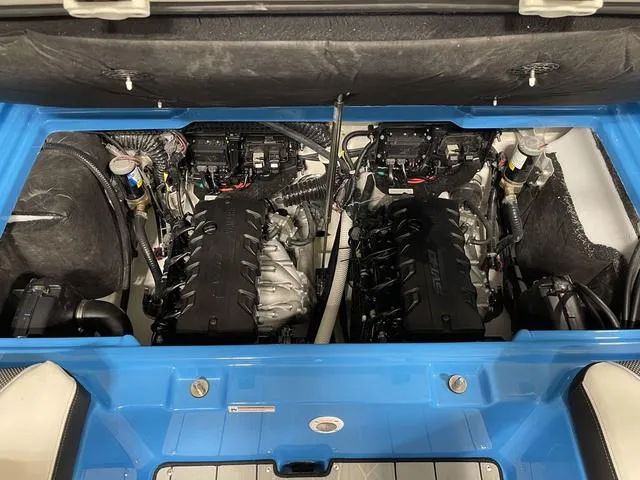 Slide: The Image of 2023 Yamaha Boats 255XD engine compartment with dual powerful engines. - 9