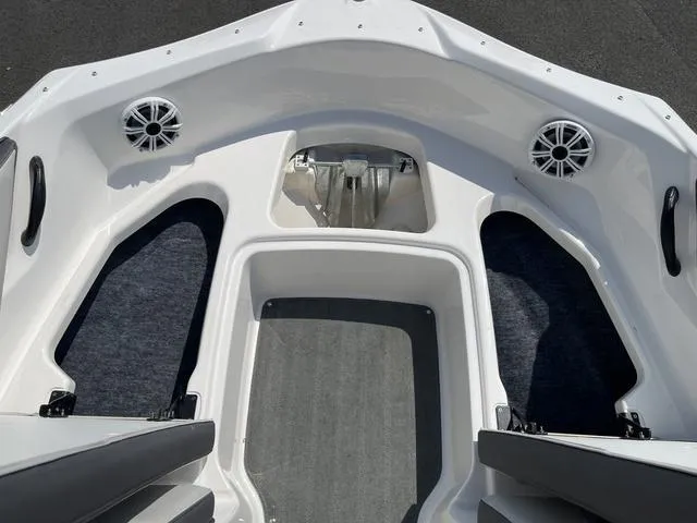 Slide: The Image of 2019 Yamaha Boats SX190 interior with speakers and seating area. - 31