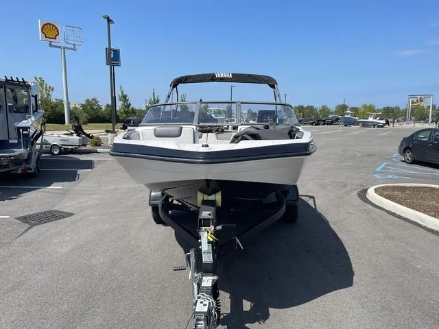 Slide: The Image of 2019 Yamaha SX190 boat on trailer in parking lot. - 4