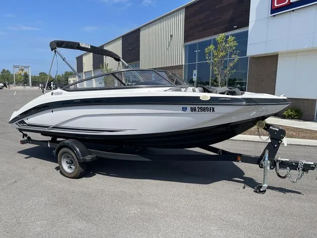 Slide: The Image of 2019 Yamaha Boats SX190 on trailer, parked outdoors. - 5