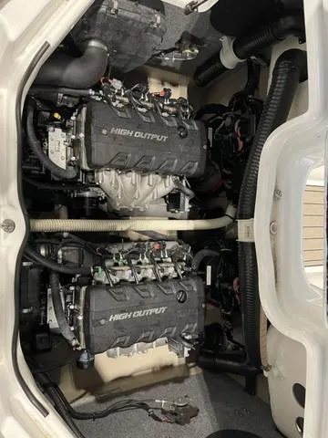 Slide: The Image of 2012 Yamaha Boats 242 Limited S engine compartment with high output engines. - 14