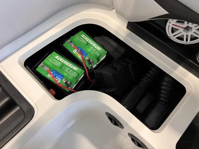 Slide: The Image of 2010 MasterCraft X-Star battery compartment with Interstate batteries and wiring. - 12