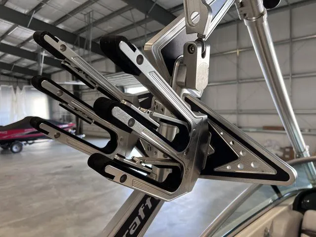 Slide: The Image of 2010 MasterCraft X-Star wakeboard rack in a boat garage. - 9