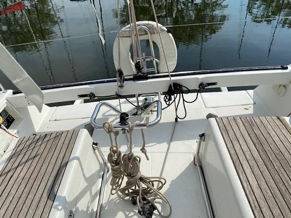 Slide: The Image of Cockpit of 2012 Beneteau First 30 sailboat with ropes and seating. - 3