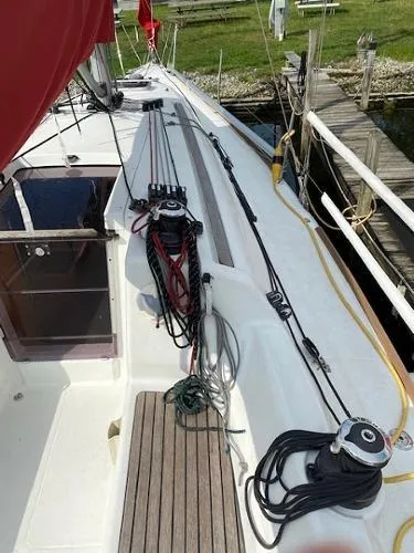 Slide: The Image of 2012 Beneteau First 30 sailboat deck with rigging and winches. - 5