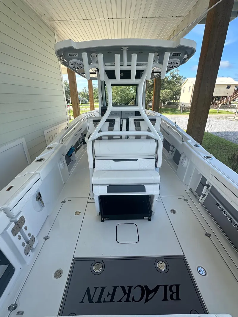 Slide: The Image of 2023 Blackfin 302CC boat interior, showcasing sleek design and spacious layout. - 3