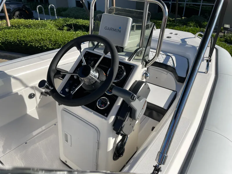 Slide: The Image of Rendova 14 boat cockpit with Garmin navigation system, 1998 model. - 8