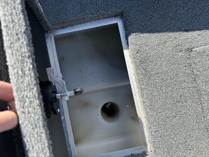 Slide: The Image of Open storage compartment in 2018 Crestliner 1850 Fish Hawk WT boat. - 19