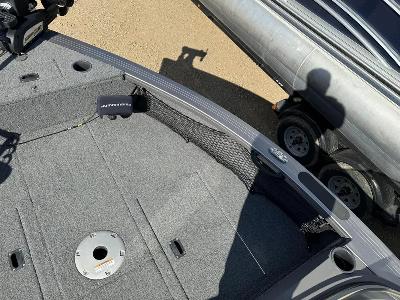 Slide: The Image of 2018 Crestliner 1850 Fish Hawk WT boat interior with fishing equipment. - 20