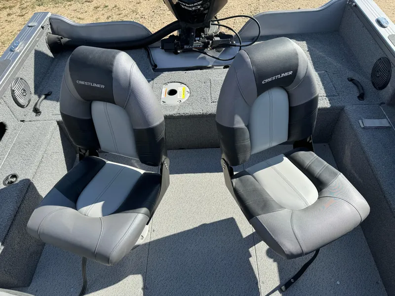 Slide: The Image of 2018 Crestliner 1850 Fish Hawk WT boat interior with two cushioned seats. - 9