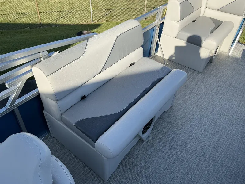 Slide: The Image of 2025 Tahoe Pontoon Boats Sport 17 REAR FISH interior seating, featuring modern gray upholstery. - 7