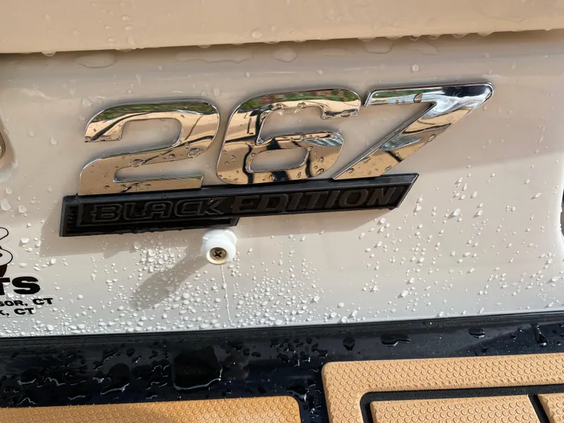 Slide: The Image of 2024 Chaparral 267 SSX Black Edition emblem with water droplets. - 4