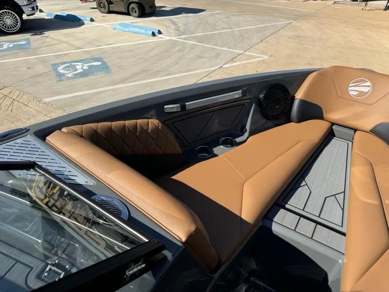 Slide: The Image of 2024 Tigé Z3 boat interior with tan leather seats and modern design. - 29