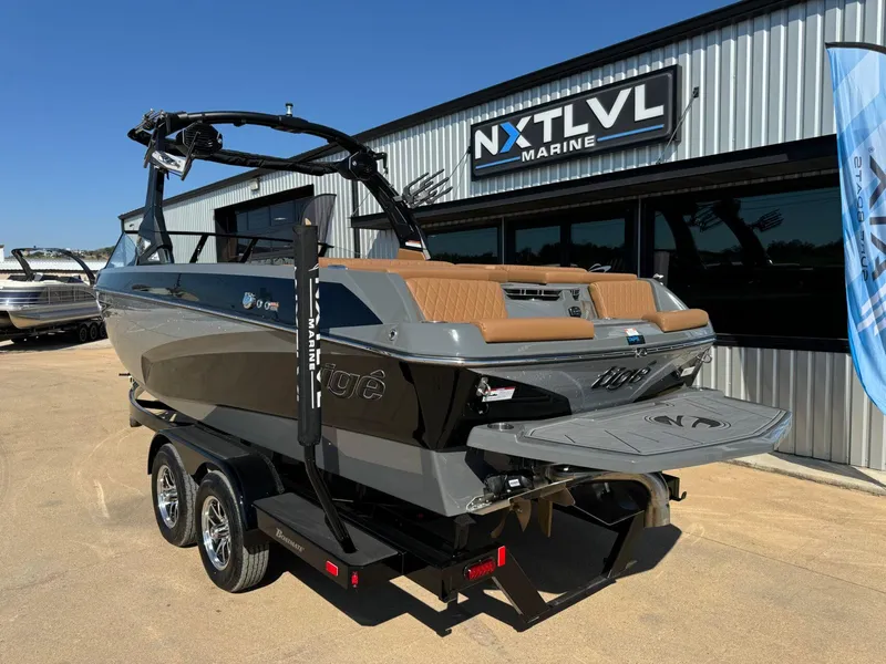 Slide: The Image of 2024 Tigé Z3 boat on trailer at NXT LVL Marine dealership. - 3